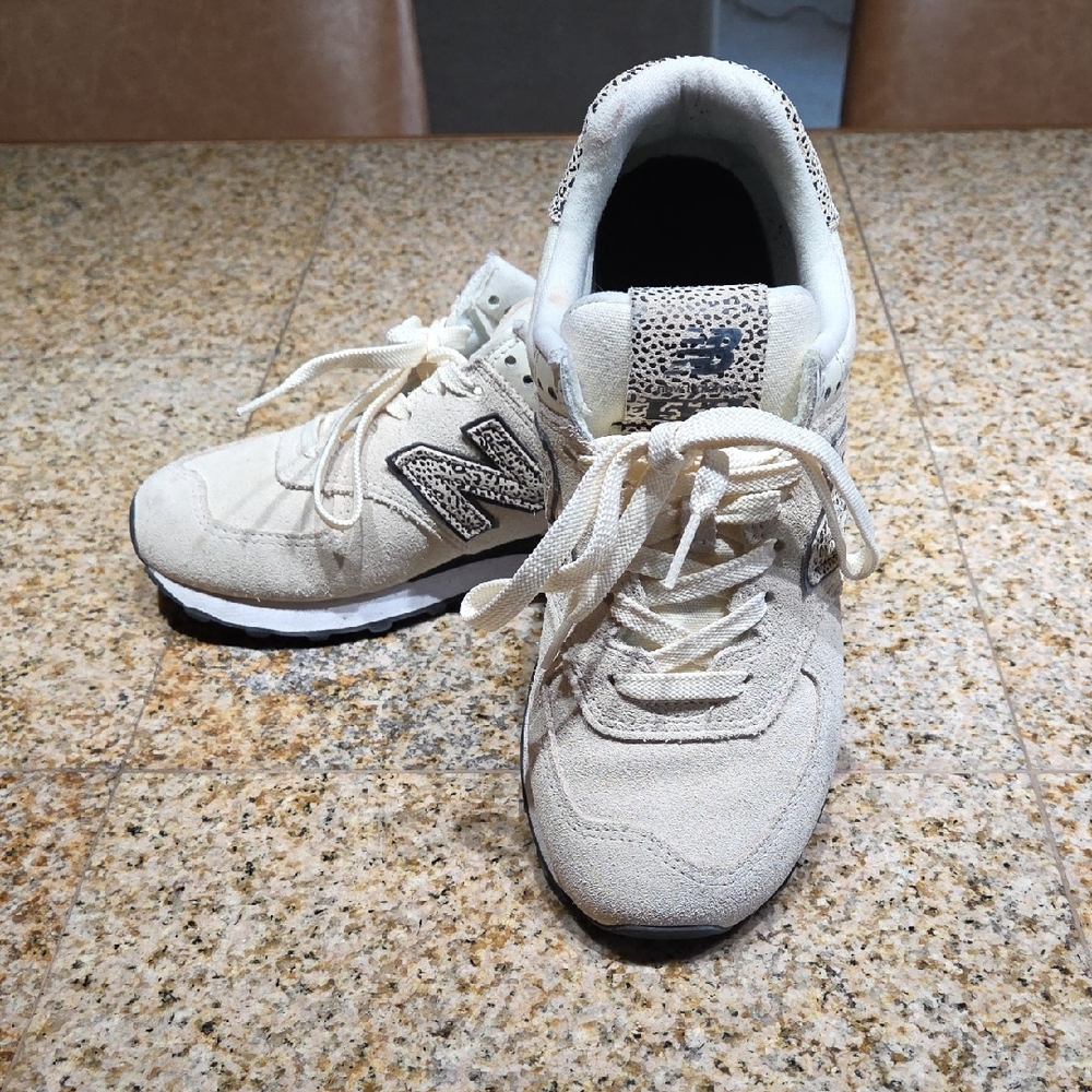 New Balance Beige and Black Sneakers
